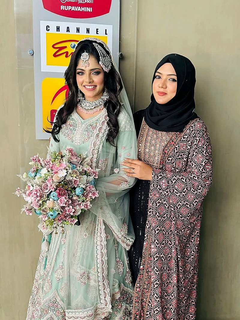 Bride with custom bouquet beside Asma
